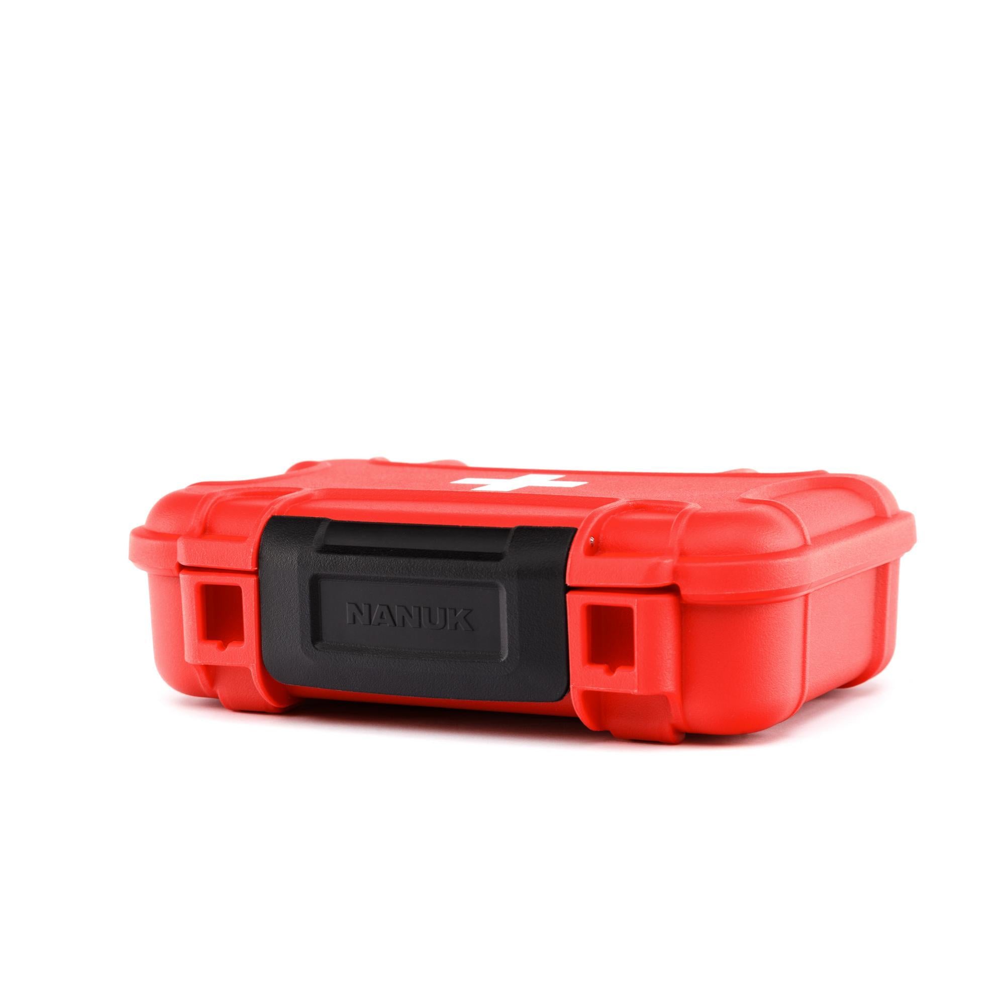 Red tool box with black lid on a white background Red tool box with black lid on a white background