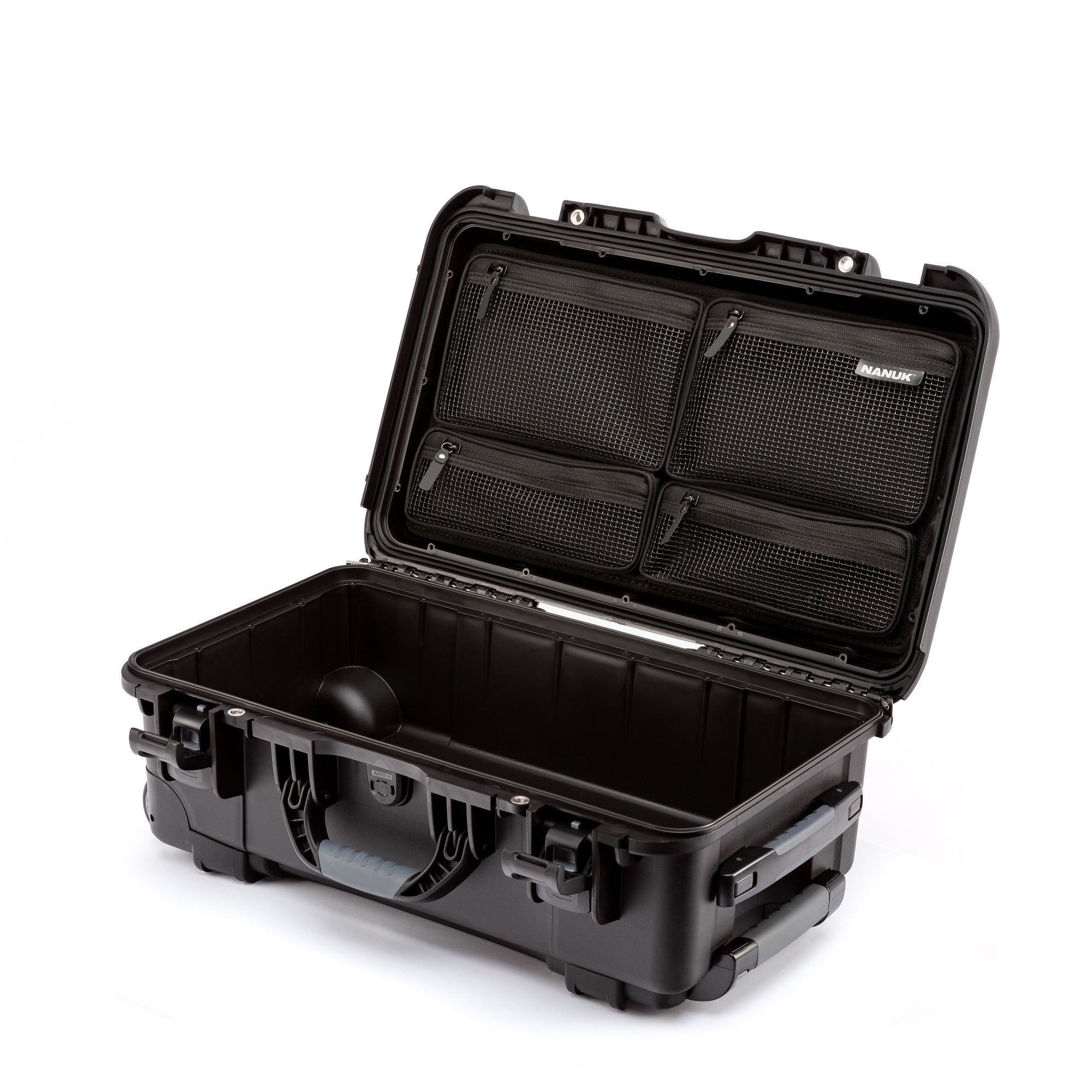 Black hard-shell travel case with open lid on a white background Black hard-shell travel case with open lid on a white background