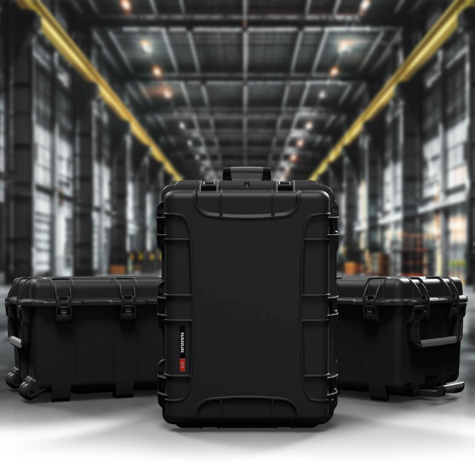 Black hard-shell cases in a warehouse setting