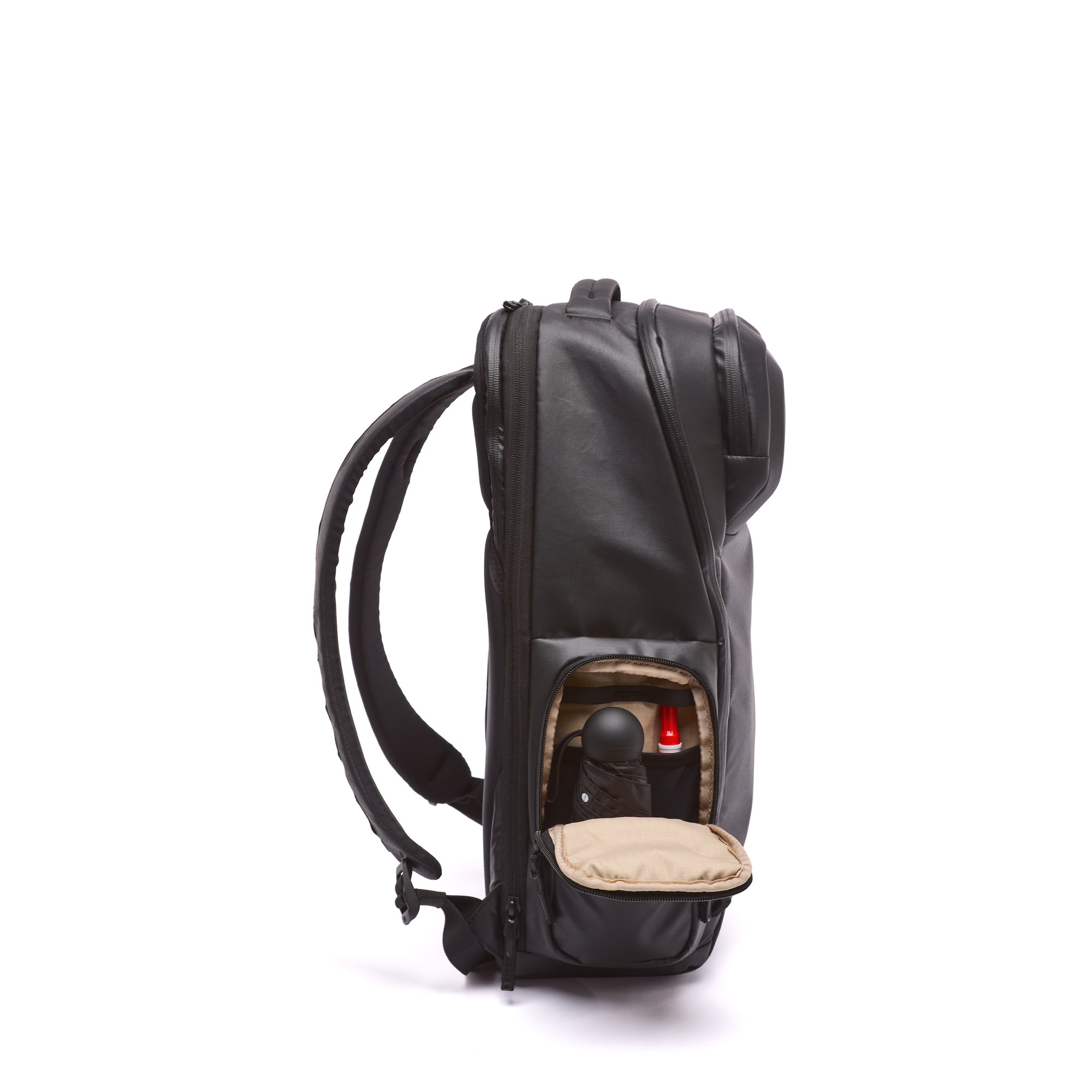 Black backpack with a red light on a white background Black backpack with a red light on a white background