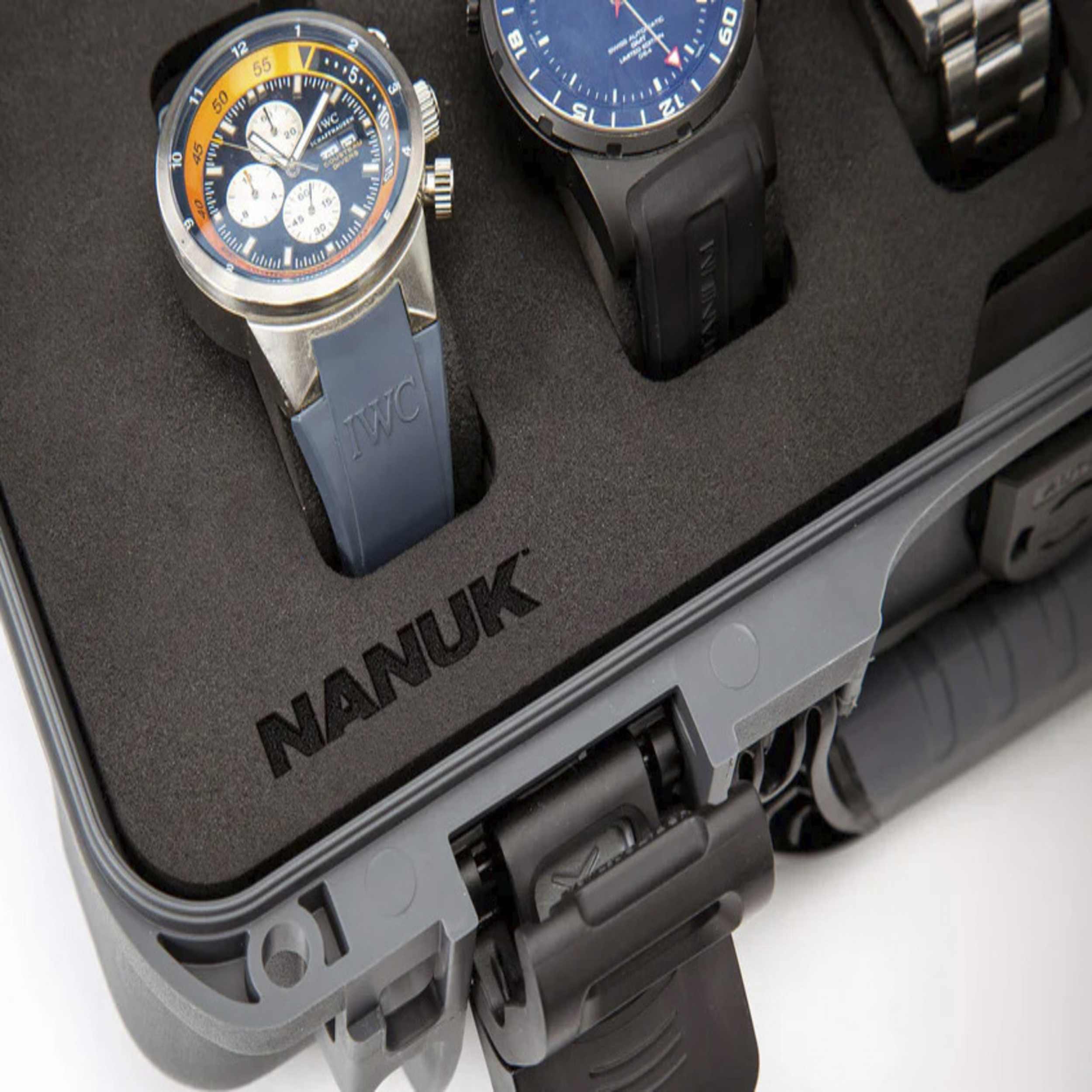 Two watches on a NANUK case with a white background Two watches on a NANUK case with a white background
