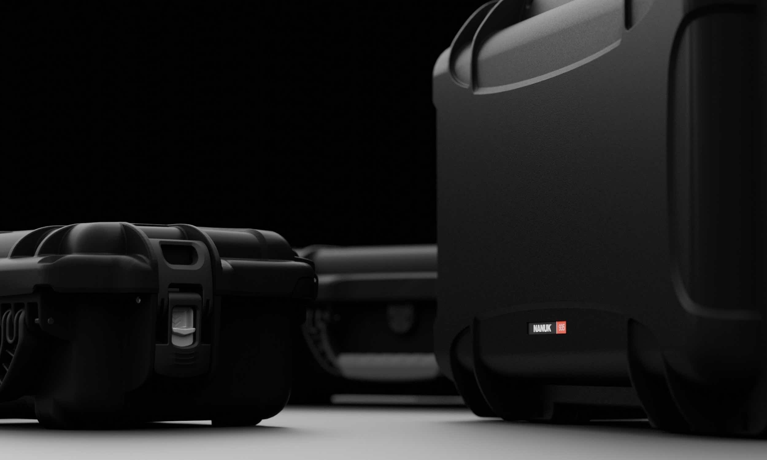 Close-up of black NANUK hard cases highlighting durability and protection for professional gear