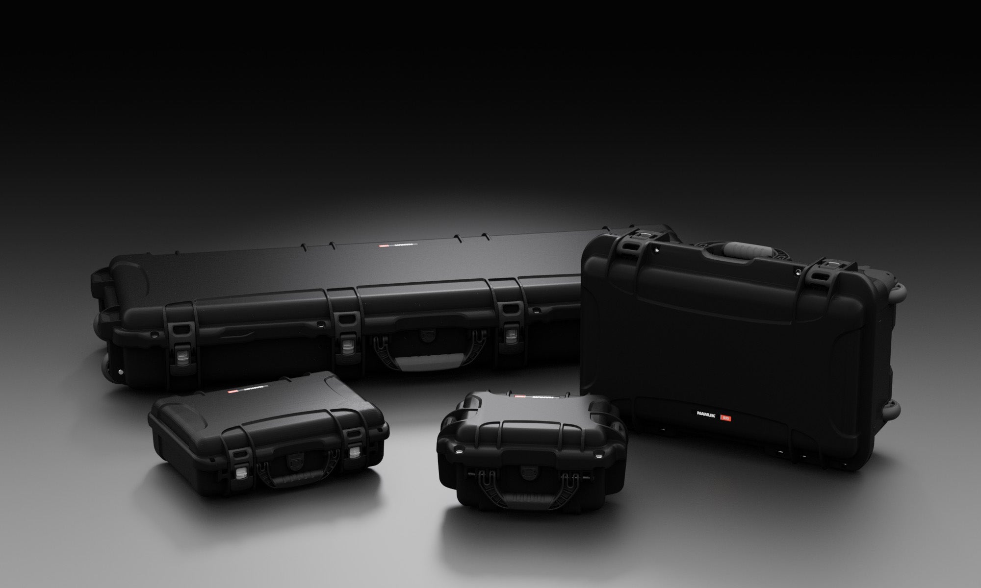 Collection of black NANUK hard cases of different sizes, highlighting durable and protective gear storage