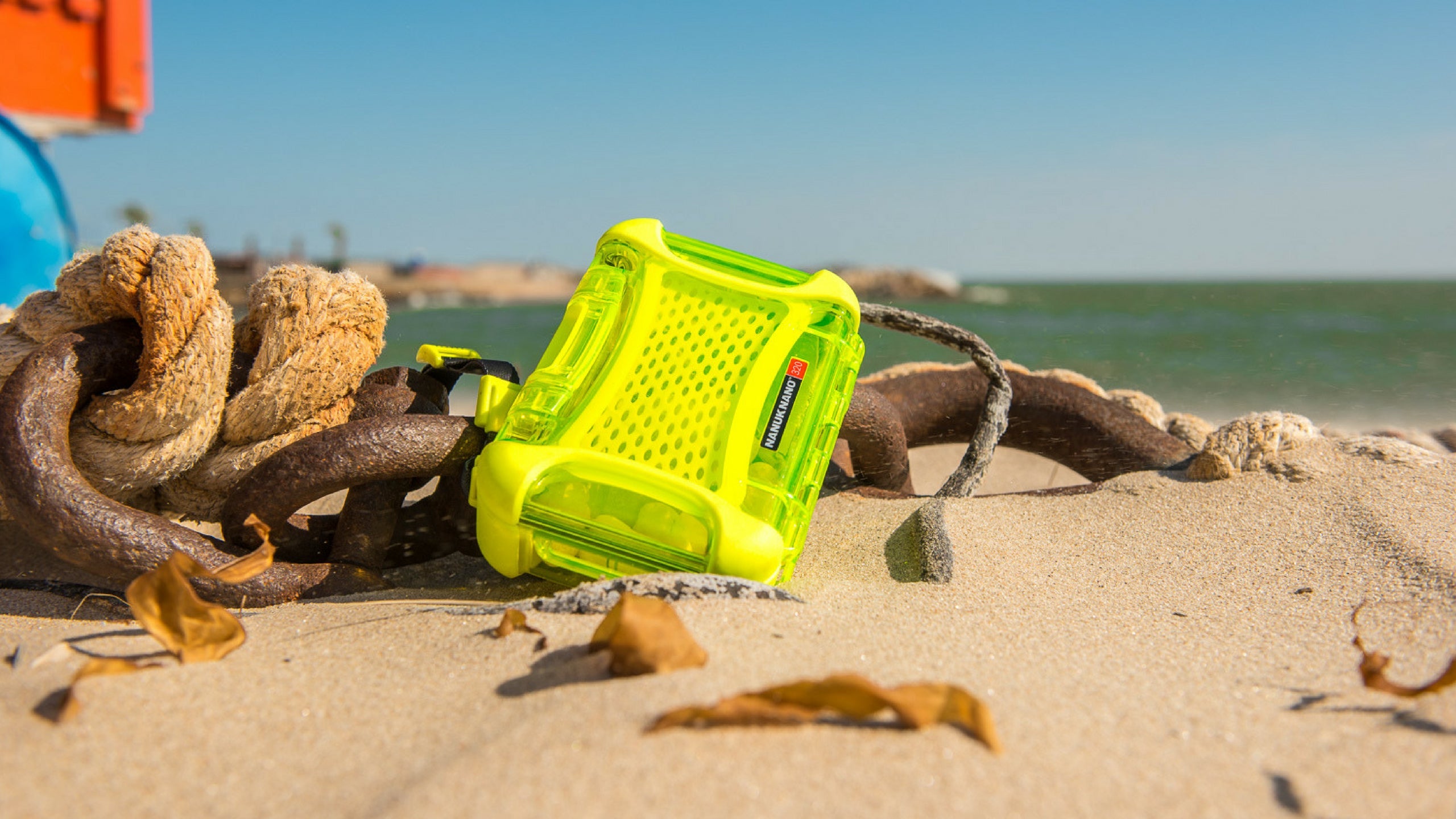 Nanuk Nano 310 Yellow case on a beach