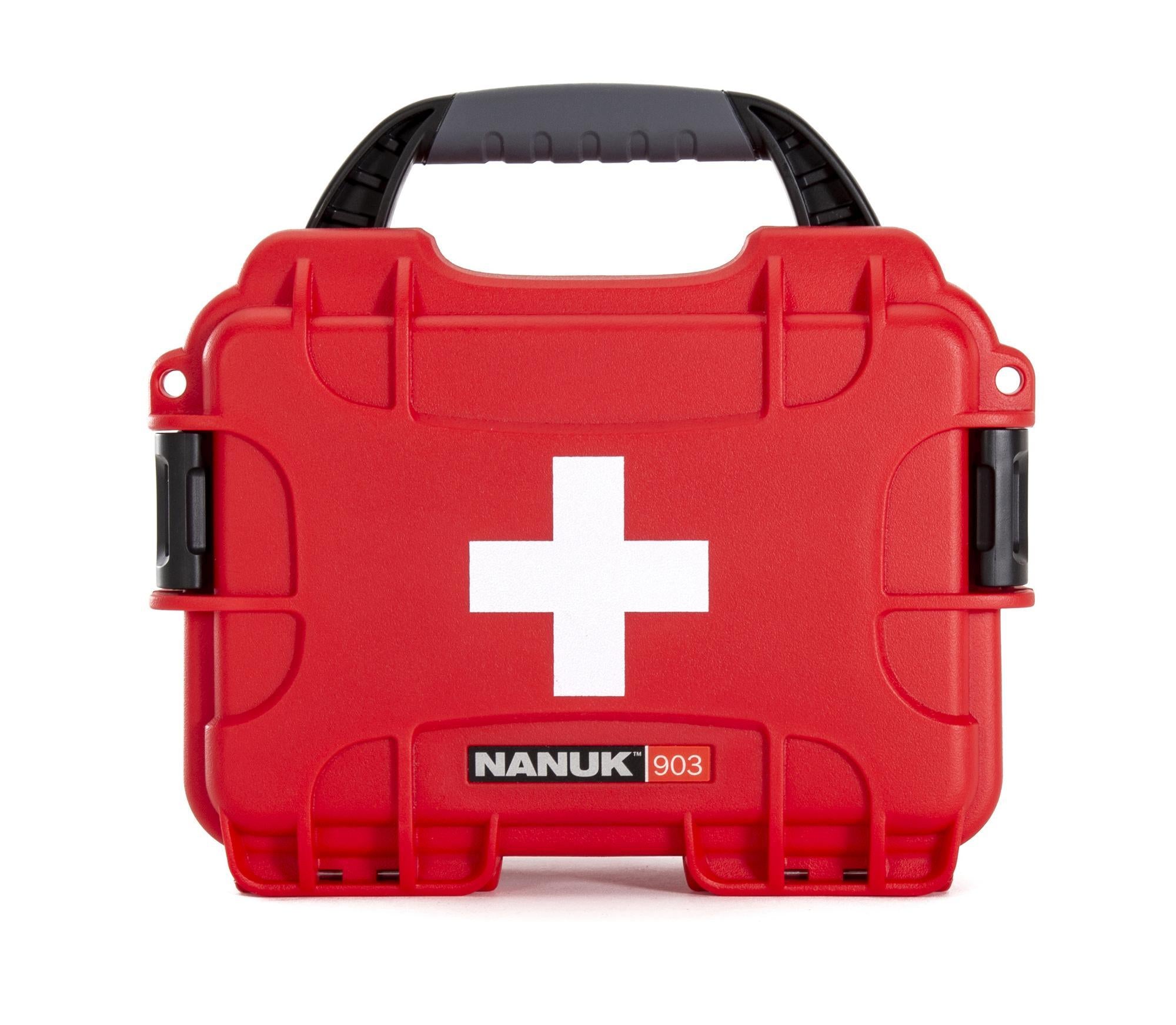 Red first aid kit with a white cross and Nanuk logo on a white background Red first aid kit with a white cross and Nanuk logo on a white background