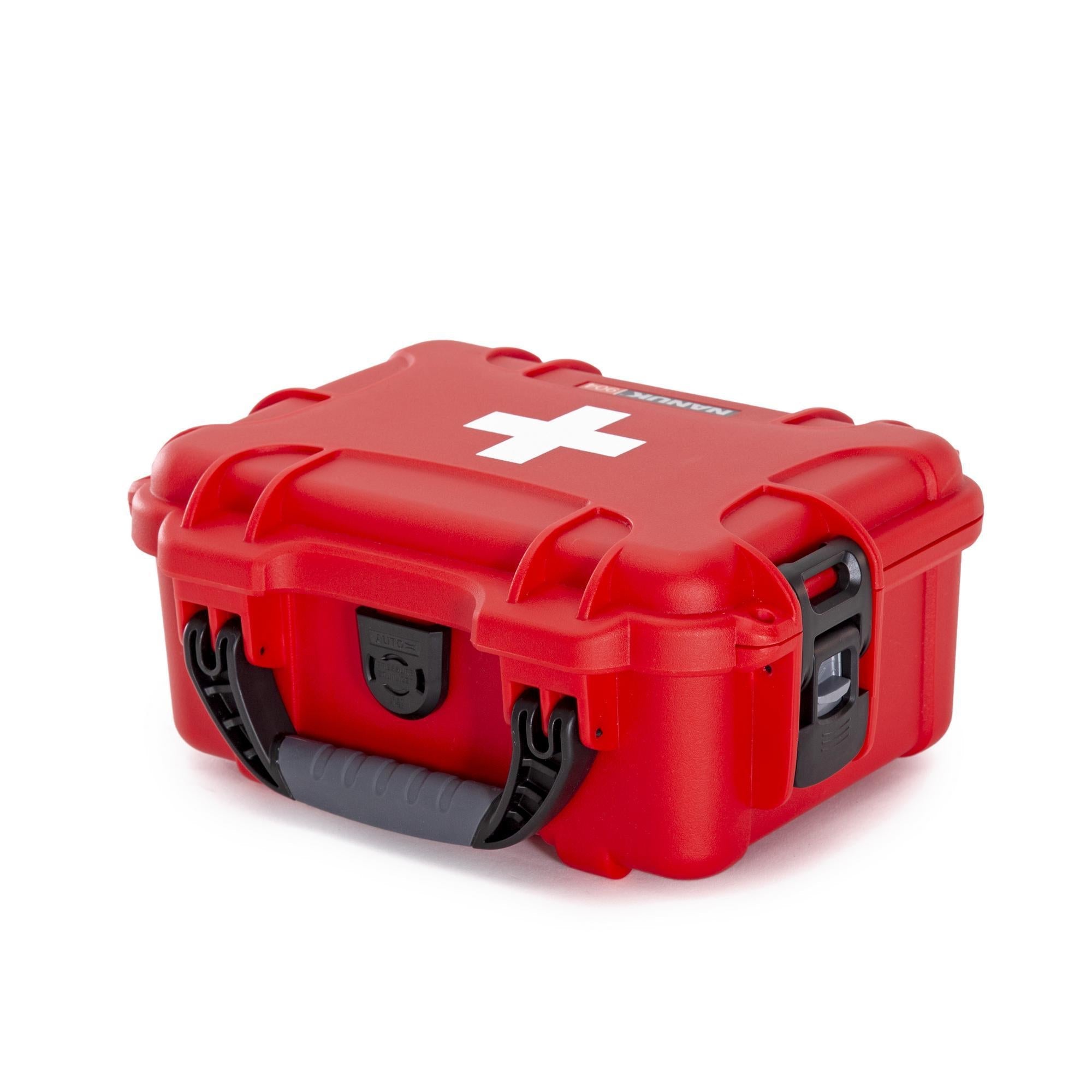 Red first aid kit with a white cross on a white background Red first aid kit with a white cross on a white background