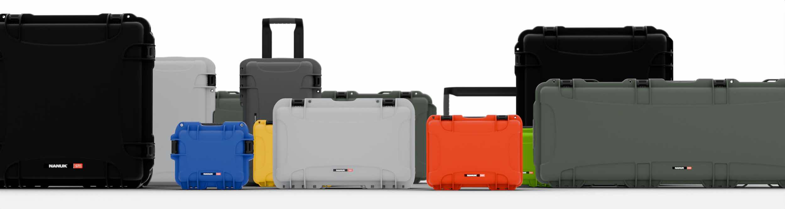 Various sizes and colors of NANUK hard cases lined up, demonstrating versatile and durable gear protection solutions