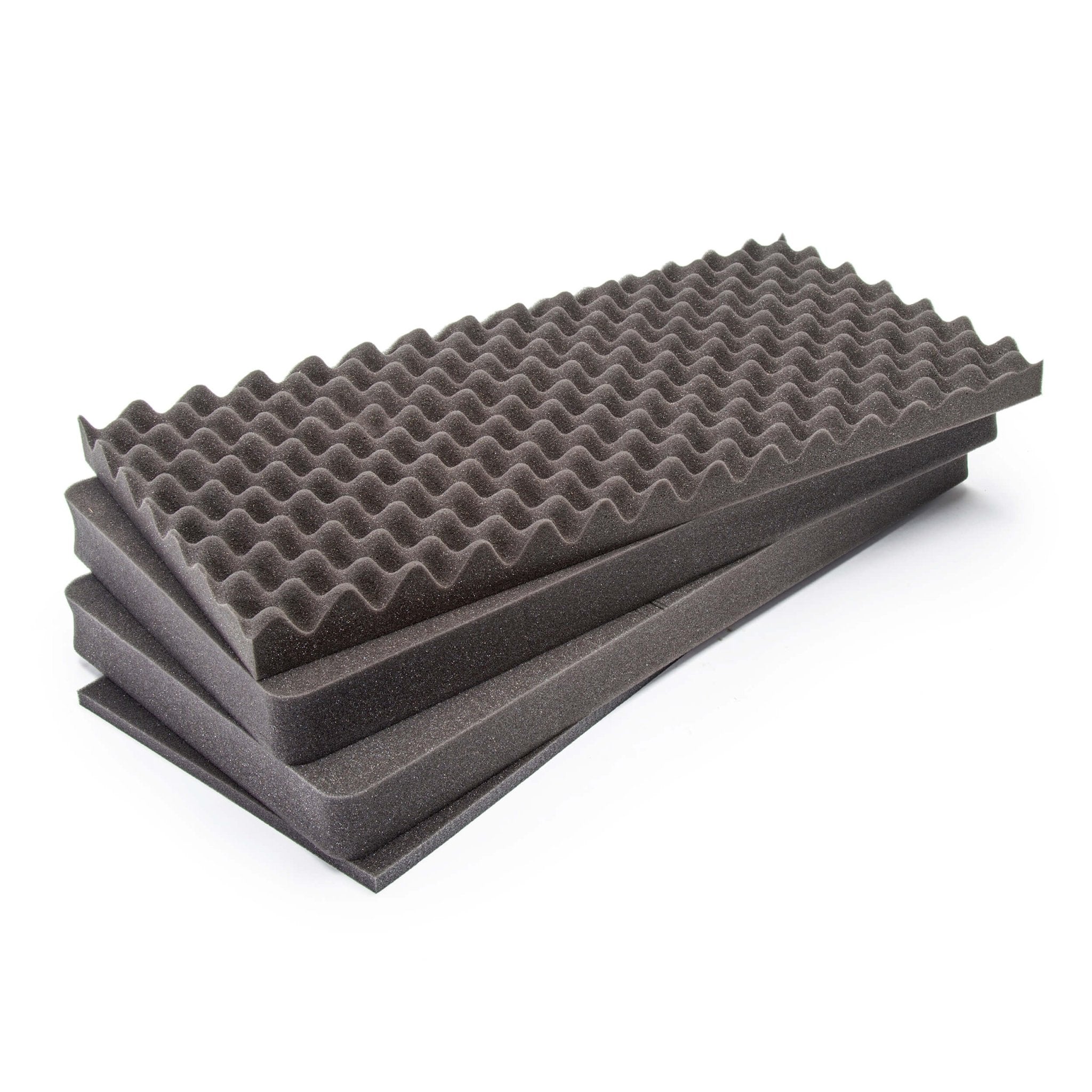 Two gray acoustic foam panels stacked on a white background Two gray acoustic foam panels stacked on a white background