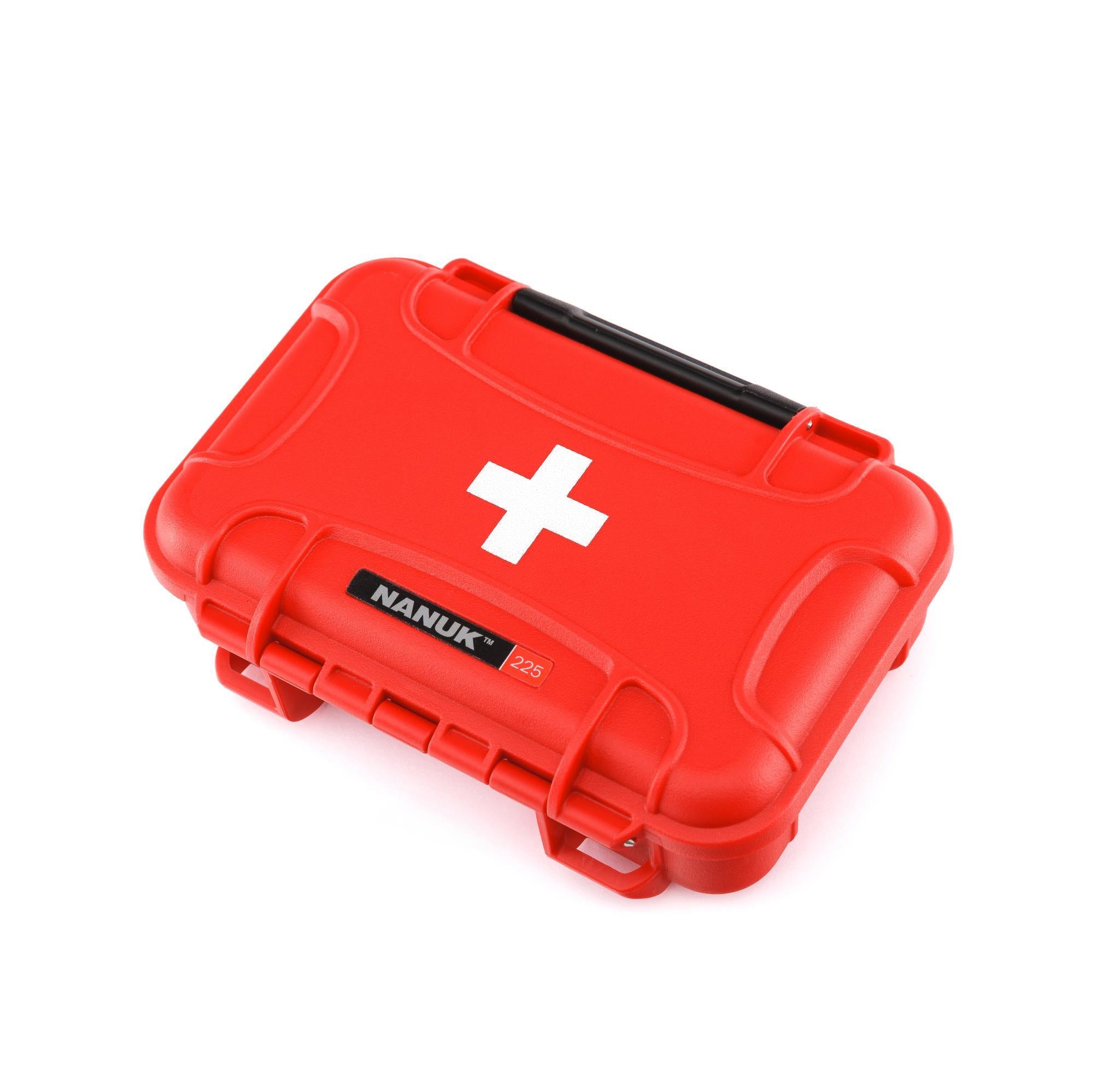 Red first aid kit with a white cross on a white background