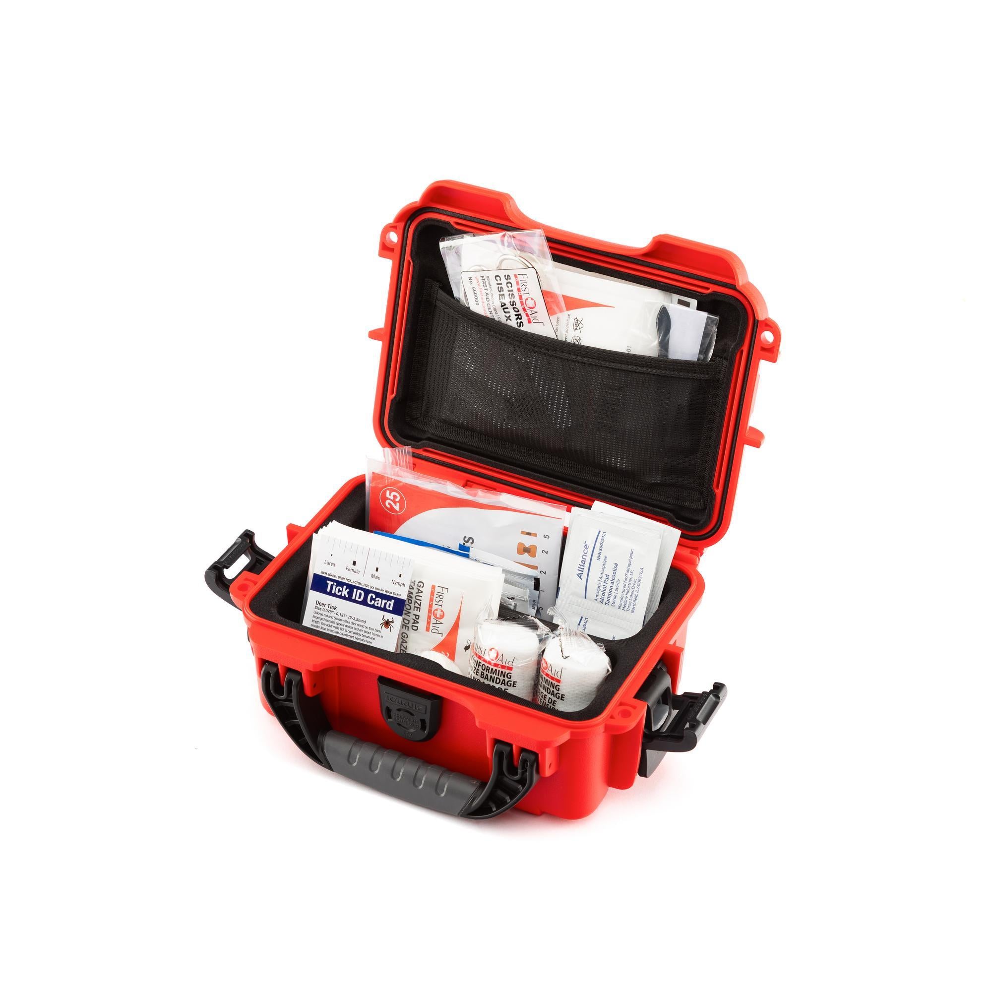 Red first aid kit with supplies on a white background