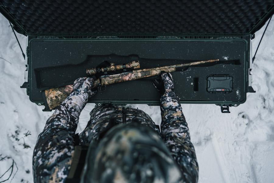 Nanuk 995 with cutted full foam insert for hunting rifle outdoor top view