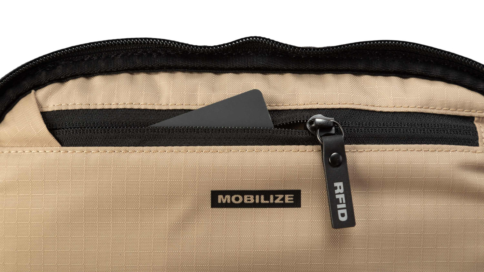 Beige bag with black zipper and 'Mobilize' label on a white background